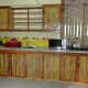 The wall in back of the tea kettle is from solid bamboo poles which is screened to keep the tropical bugs out!