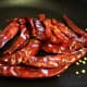 Roast dry red chilies