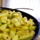 After adding chopped apples to seasoned oil