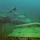 military-warship-tank-airplane-graveyard-under-the-sea-sunken-wwii-hardware
