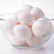 White eggs in a transparent bowl