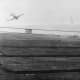 USS White Plains under attack from kamikaze.