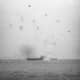 USS Enterprise off the beaches Okinawa during a kamikaze attack .