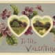 Vintage two hearts valentine card with violets