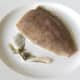 Snip the fins from the fish