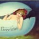 Vintage Easter cards: pretty woman coming out of a cracked Easter egg