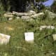 The headstones of three Beebe children are to the right of the obelisk - Jessie, 2, Minnie, 4, and Mitty, 7.