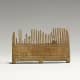 Wooden comb from the same era. 