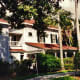 View of Edison home and partial view of guest house