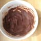 This is the mixture of nut butter, cocoa and agave nectar that I often use to make chocolate bark. The mixture is nice as a spread on bread or crackers or as a frosting on cakes.