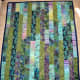 Batik strip quilt in cool colors