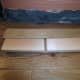 Cut V in skirting board to bend round slight curve and 3mm plywood as filler for lower part of skirting against the wall.