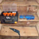 A Dremel with the mini drum sander for the very edges and corners