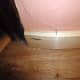 V cut in skirting to allow it to bend.