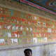 Wall full of paintings