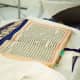 The Holy book of the Sikhs. The Rumala sahib is rolled over and tucked at the top when the Holy book is read.