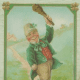 St. Patrick's Day cards: Irish lad in green coat with pig &quot;Dear Old Ireland&quot;
