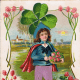St Patricks Day cards: Irish lad with blue cape, purple pants with large shamrock behind him