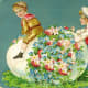 Two vintage cute kids with a large floral Easter egg covered with flowers
