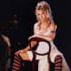 Beautiful Farrah Fawcett in white dress