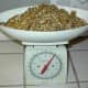 First weigh your nuts. Don't forget to put the container on empty first to set scale to zero before putting nuts in container. You want 400 grams of nuts for each pound of wheat. Double if you want a lot extra for more people