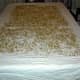 You will want to spread the wheat berries out so they form only one layer. It looks easy, but you need to be careful not to get close enough to the edge of the table for the wheat to fall on the floor.