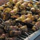 Angels On Horseback is one of the most delightfully delicious appetizers you will ever taste. Here we have them served on skewers and then they were grilled on a charcoal grill before being served.