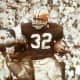 Cleveland Browns Hall of Fame running back Jim Brown runs against the Los Angeles Rams in a 42-7 loss at the Los Angeles Coliseum on 12/12/1965. (Photo by Darryl Norenberg/NFL)