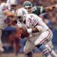 Earl Campbell, Houston Oilers 1980 - 1,934 yards.