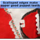 The scalloped edges on that old Christmas stocking worked fantastic as Sock Puppet teeth!