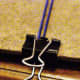 6.  Anchor the two filler chords to a clip board using a stationary clip.