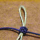 5.  A slip knot closure consisting of two square knots.  Test the slip knot by holding onto the loop and gently sliding the blue square knots up and down to alter the size of the loop.