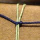3.  For your closure you will create two square knots which will serve as a slipknot closure. Create a right half knot.