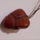 This stone is actually a Lake Superior Agate, but I have created a nylon cord nest for it using the same technique.