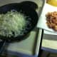 Drain the bacon on paper towels and cook the chopped onions.