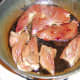 Lamb heart is added to the pan with the liver