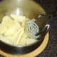 Potatoes are mashed with remaining butter