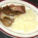Heart, liver, bacon and mash are plated