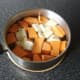 Sweet potatoes and parsnip prepared for boiling