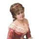 A lady of the Victorian age wearing a red headband.