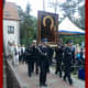 The icon is currently (June 16, 2012) touring Northern Poland in a special van, with police and fire brigade escorts.  Here it is being processed from the open-air Mass at the Capuchin Church in Krynice Morska, on the Baltic. The uniformed men are fi