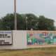 You are here. Yes, following that blank white wall down Riverfront Drive headed South, you finally reach 100 Riverfront Drive, NLR AR