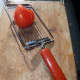 Slicing the tomato, there is a knack to using this slicer so you don't cut yourself, but once you get the knack it is a handy little utility which I find very useful.