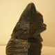 Side view of the vintage Halloween black cat.