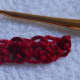Break off BUT DO NOT FASTEN OFF YET. (If you fasten off like I did in the photo, the last stitch of the next row will be difficult to crochet.)