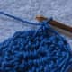 Y o, draw through all loops on hook, ch 1. Note that the pineapple stitch just made overlaps with the first pineapple stitch.