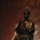 Bronze statue of Saint Peter. His left foot is worn from all pilgrims touching it in sign of worship and prayer.