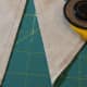 3. Cut in half on drawn line.