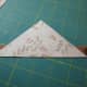 2. Center the strip to the diagonal cut and sew together, using a 1/4" seam. Sew the other triangle to the other side of the strip.
