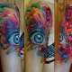 Eye tattoo with feathers